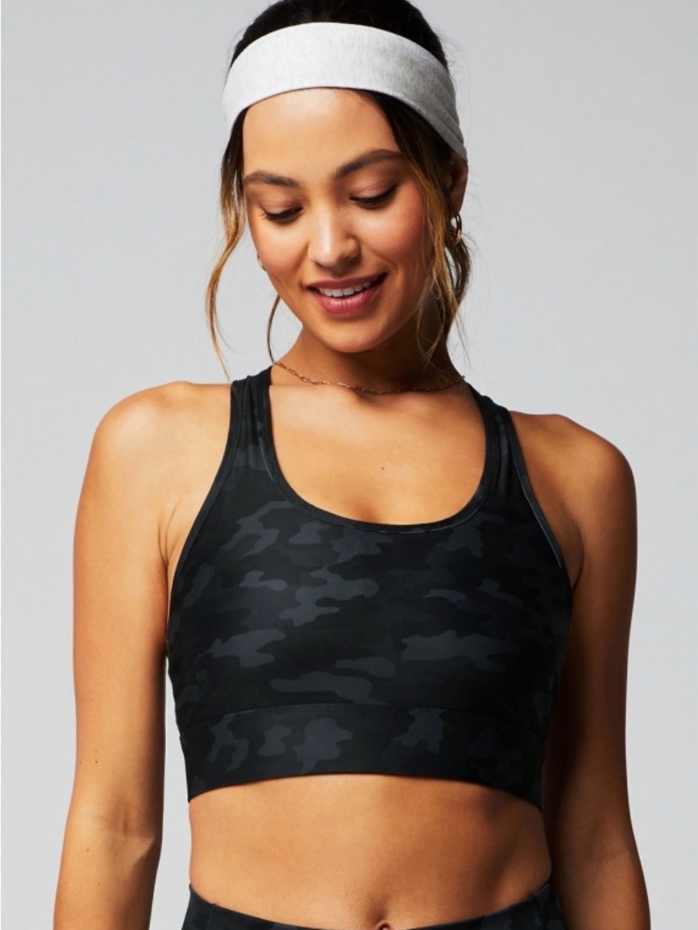 Fabletics On-The-Go Medium Impact Sports Bra in Black Camo